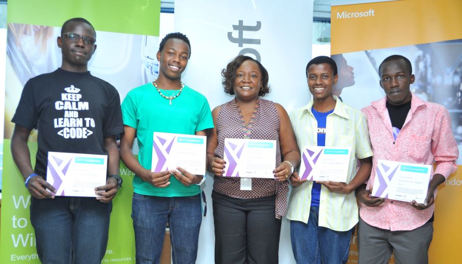 Microsoft ESA Head of Marketing PR Laura Chite Pauses For Photo With JKUAT Team Africon After They Won Microsoft Kenya Imagine Cup Competition 2014